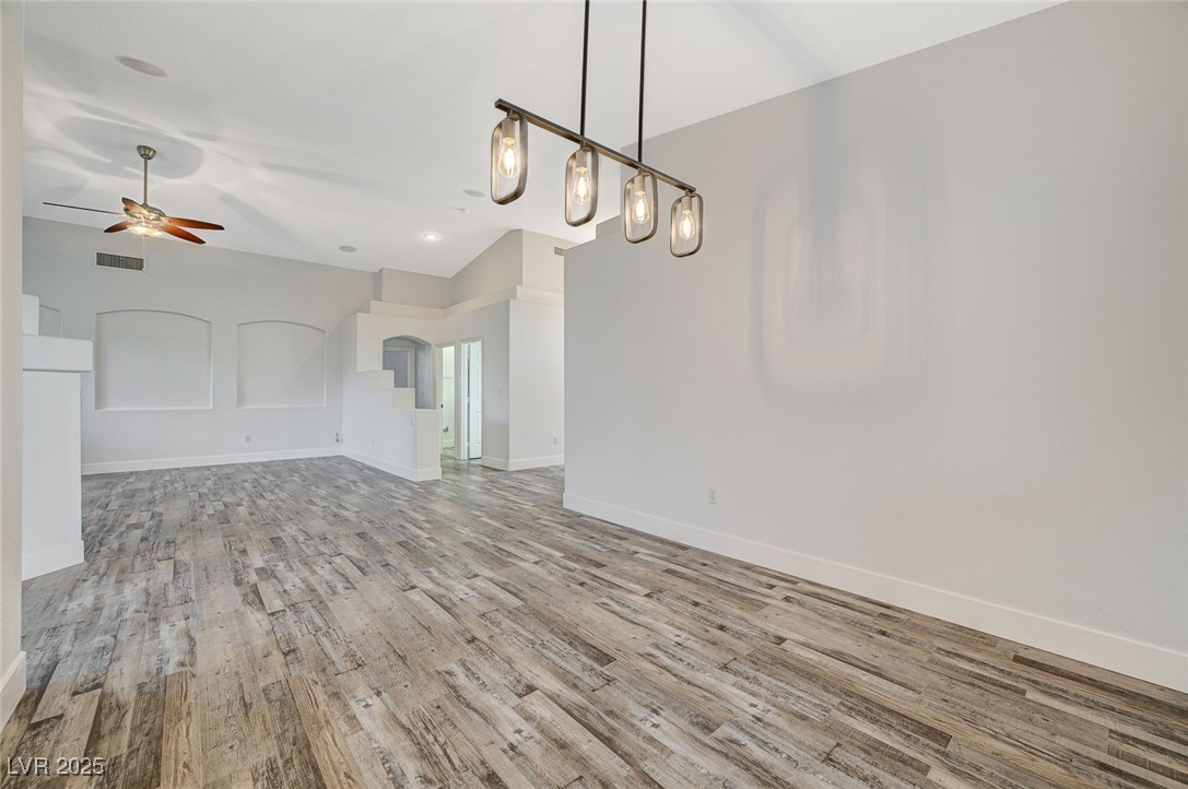 1335 Rolling Sunset Street Henderson, NV 89052 - Photo 25 of 72 Spare room with visible vents, wood finished floor