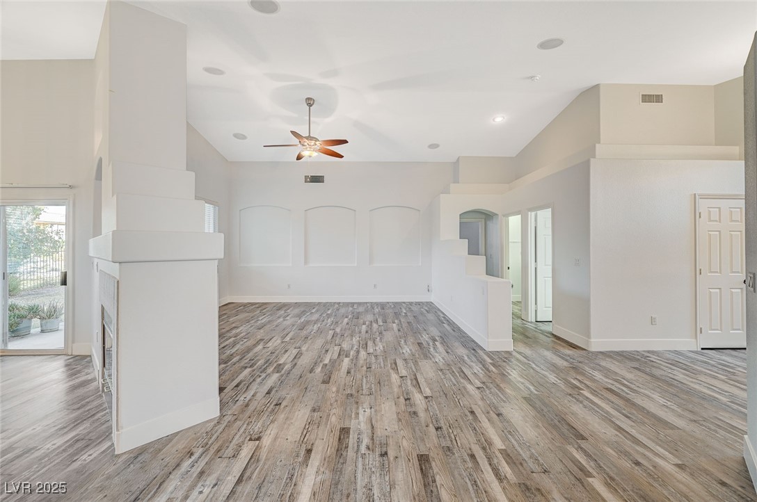 1335 Rolling Sunset Street Henderson, NV 89052 - Photo 26 of 72 Unfurnished living room with ceiling fan, visible