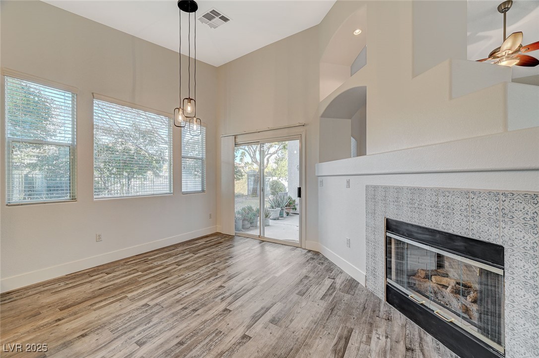 1335 Rolling Sunset Street Henderson, NV 89052 - Photo 27 of 72 Unfurnished living room with visible vents, a ceil