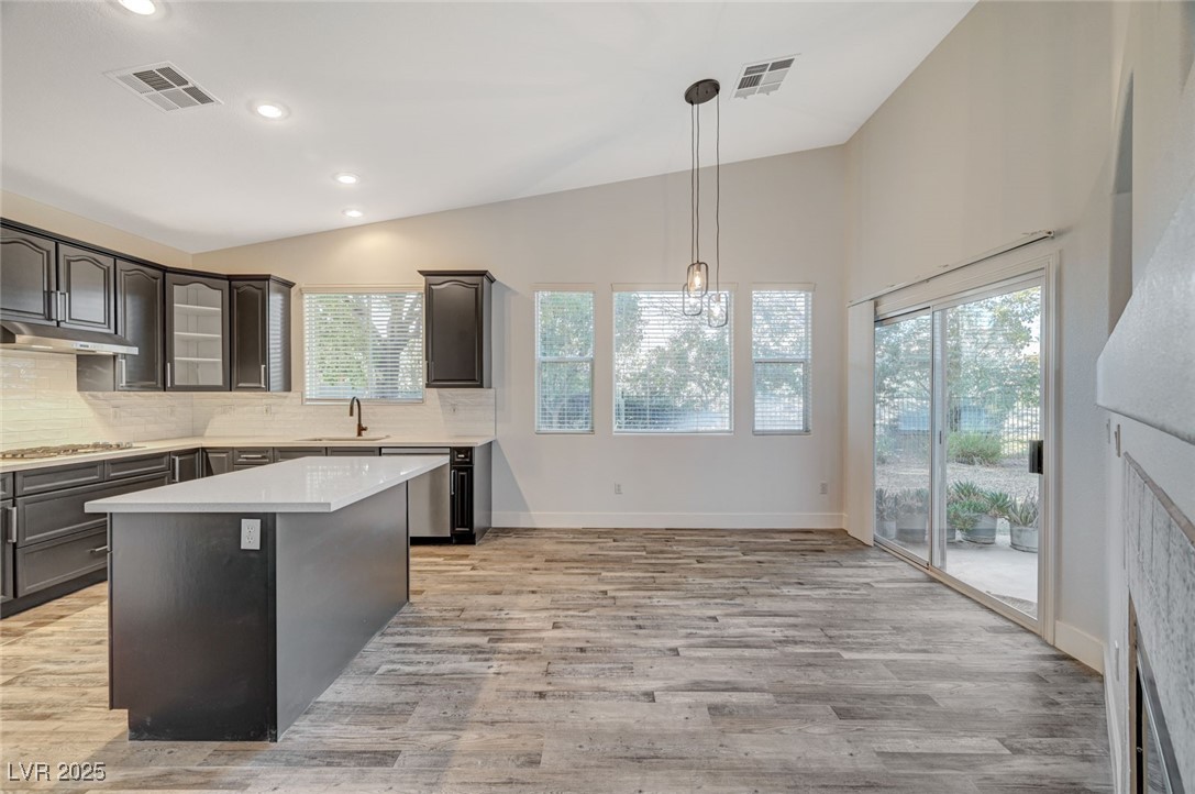 1335 Rolling Sunset Street Henderson, NV 89052 - Photo 39 of 72 Kitchen featuring visible vents, light wood finish