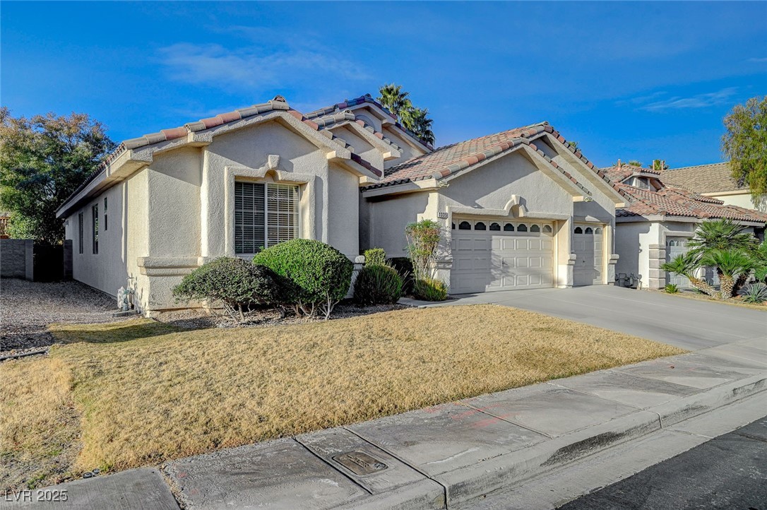 1335 Rolling Sunset Street Henderson, NV 89052 - Photo 4 of 72 Mediterranean / spanish house with concrete drivew