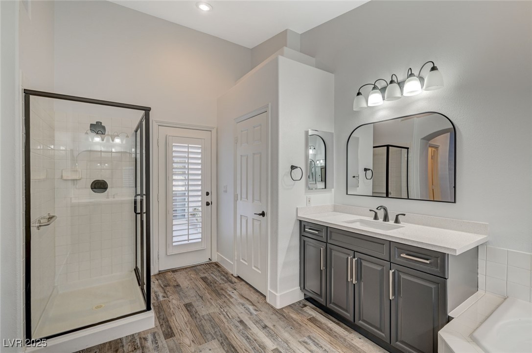 1335 Rolling Sunset Street Henderson, NV 89052 - Photo 46 of 72 Full bath featuring vanity, wood finished floors,