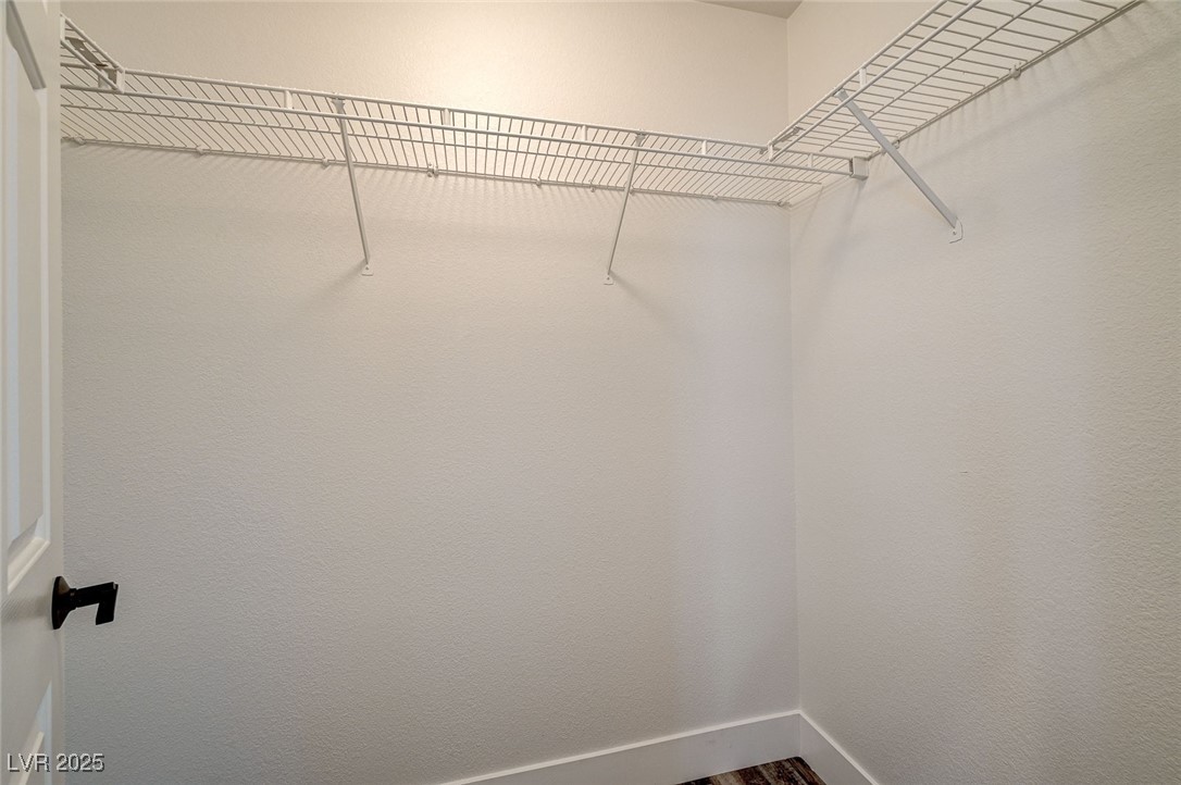 1335 Rolling Sunset Street Henderson, NV 89052 - Photo 47 of 72 Walk in closet with wood finished floors