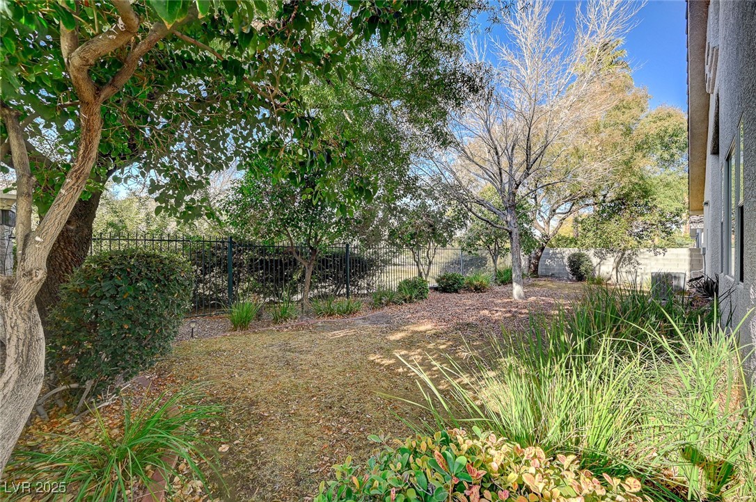 1335 Rolling Sunset Street Henderson, NV 89052 - Photo 58 of 72 View of yard with a fenced backyard