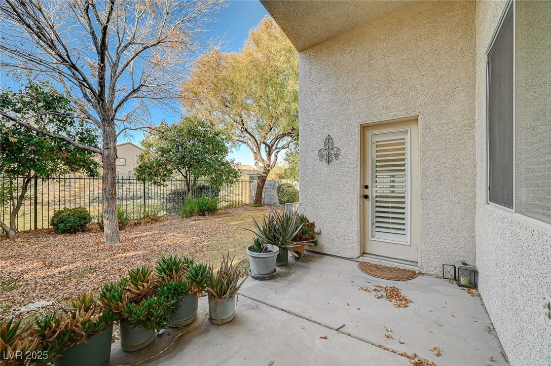 1335 Rolling Sunset Street Henderson, NV 89052 - Photo 60 of 72 View of patio / terrace with fence