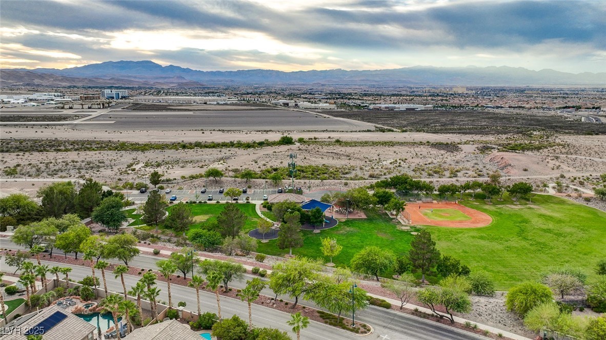 1335 Rolling Sunset Street Henderson, NV 89052 - Photo 68 of 72 Birds eye view of property featuring a mountain vi