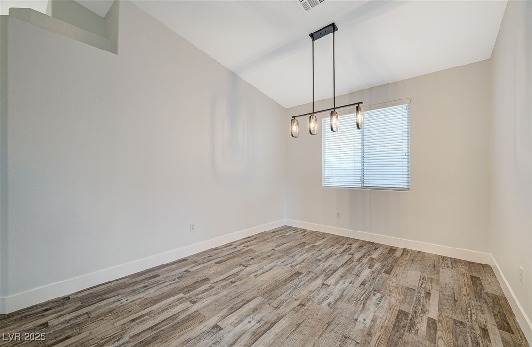 1335 Rolling Sunset Street Henderson, NV 89052 - Photo 8 of 72 Empty room featuring visible vents, baseboards, a