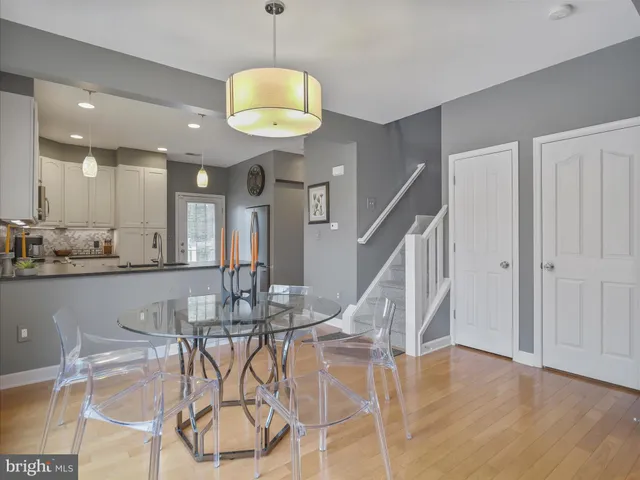 a view of a dining room and chandelier