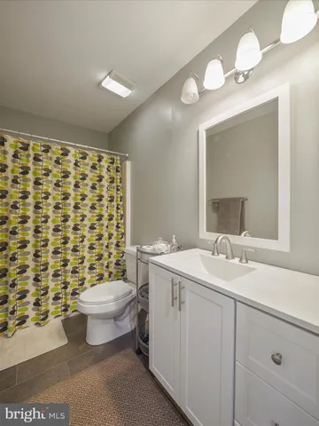 a view of a livingroom with furniture and wooden floor