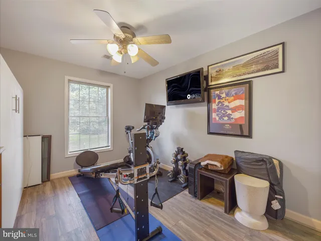 a view of a livingroom with furniture and wooden floor