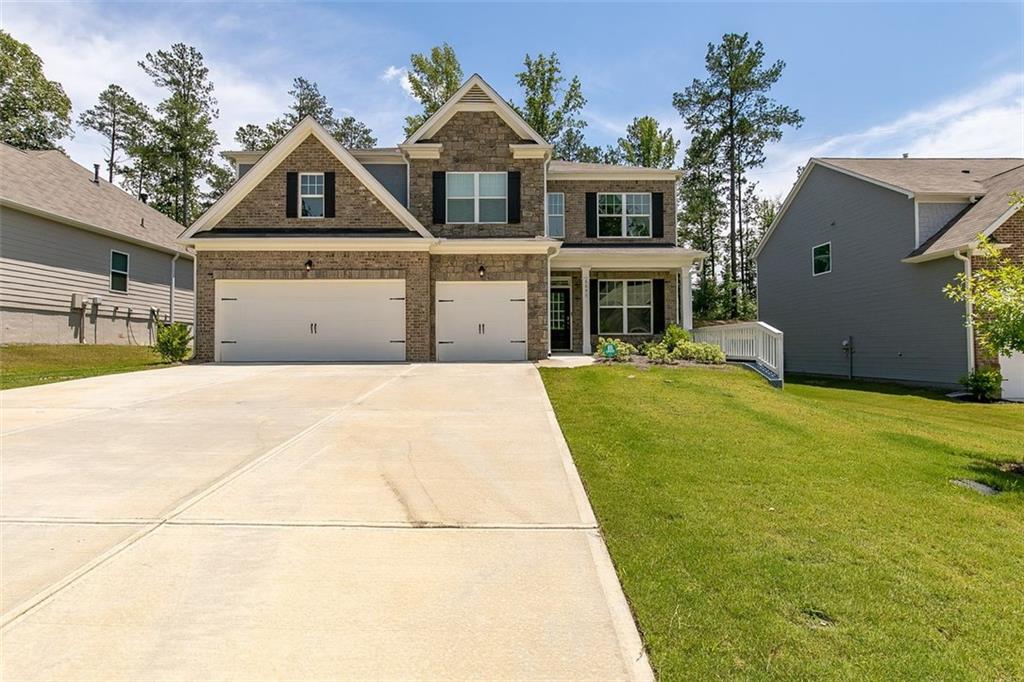 6650 Springfield Way Atlanta, GA 30331 - Photo 1 of 1 a front view of house with yard