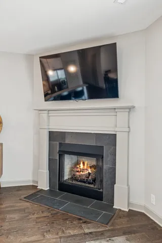 a living room with a fireplace
