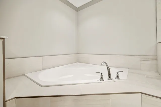 a bathroom with a bathtub