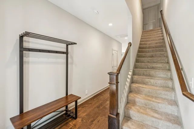 a view of entryway with wooden floor
