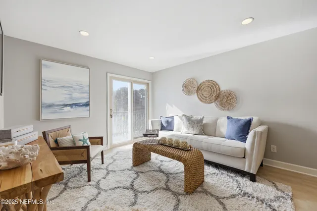 a bedroom with a bed and cabinets