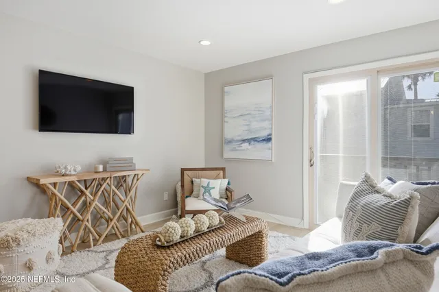 a bathroom with a sink toilet a mirror and shower