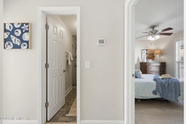 a bathroom with a shower and a toilet