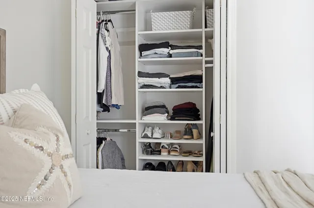 a view of balcony with a potted plant