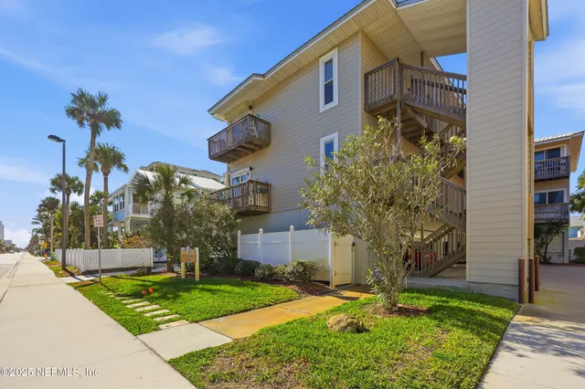 a view of a kitchen from the hallway