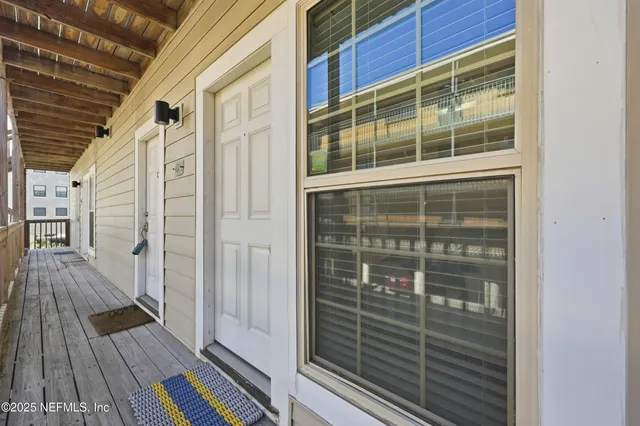a kitchen with a sink stove and microwave
