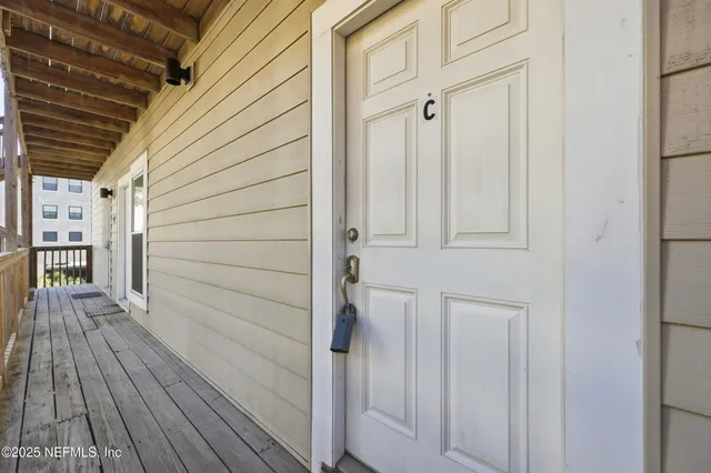 a kitchen with stainless steel appliances a refrigerator a stove a microwave and cabinets