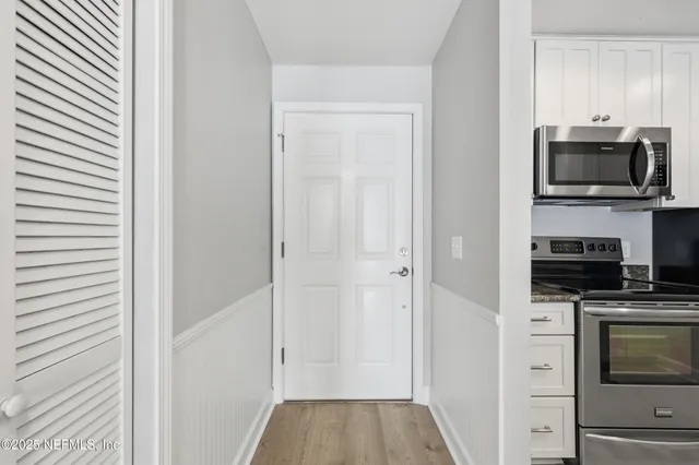 a very nice looking dining room with a table and chairs