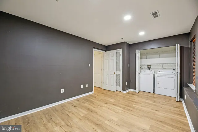 a view of a livingroom with wooden floor