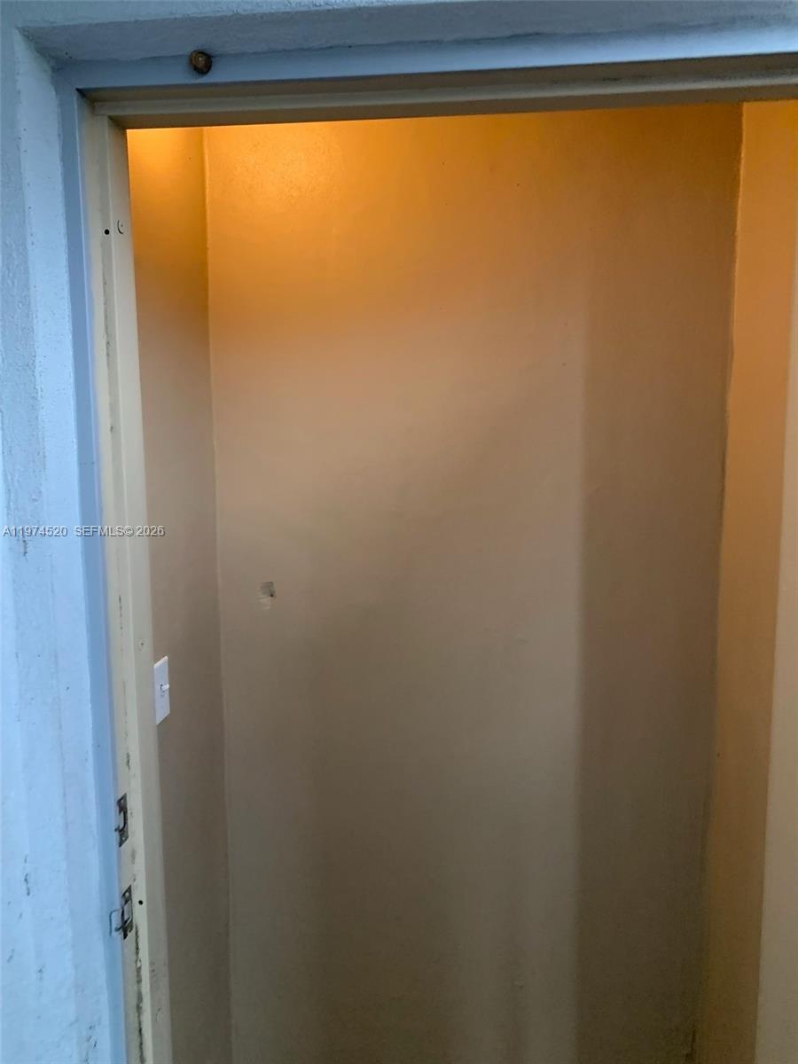 15440 Southwest 284th Street, Unit 5102 Homestead, FL 33033 - Photo 22 of 27 a view of a large window with a balcony