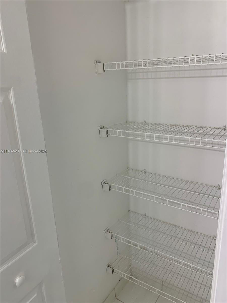 15440 Southwest 284th Street, Unit 5102 Homestead, FL 33033 - Photo 25 of 27 a bathroom with a shower