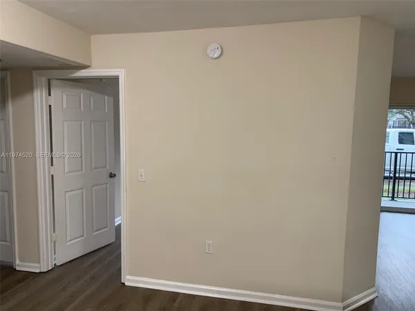 a view of small space with wooden floor