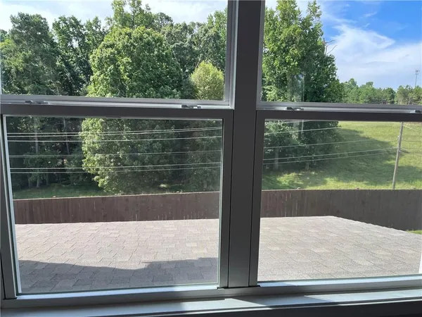 a view of front a house with a yard