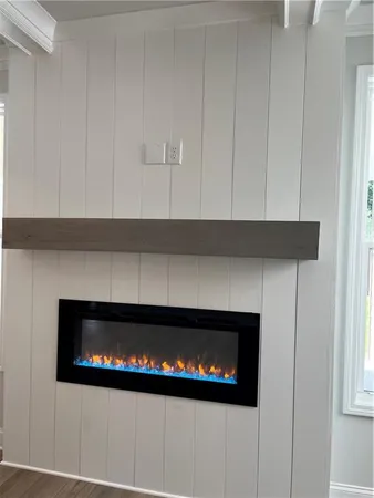 a living room with a fireplace