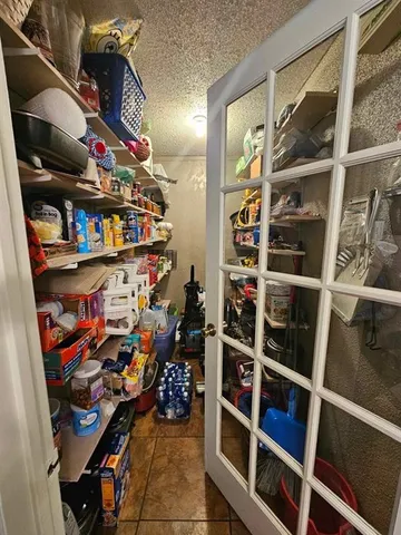 a store room with lots of different colored cloths