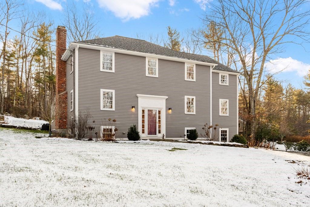 420 Old Harvard Road Boxborough, MA 01719 - Photo 1 of 37 a view of a house with a snow in the yard