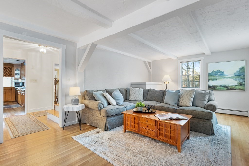 420 Old Harvard Road Boxborough, MA 01719 - Photo 15 of 37 a living room with furniture wooden floor and a large window
