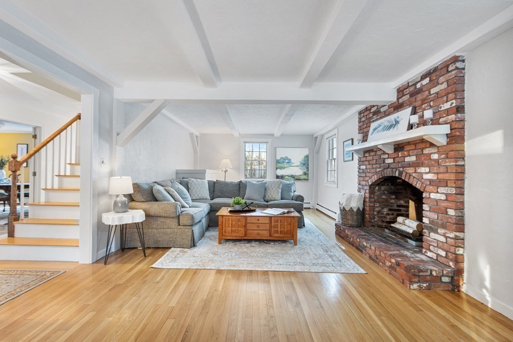 420 Old Harvard Road Boxborough, MA 01719 - Photo 16 of 37 a living room with furniture and a fireplace
