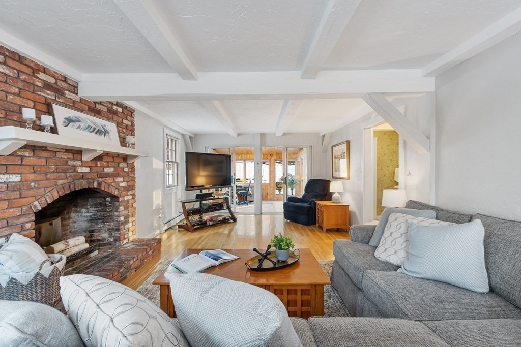 420 Old Harvard Road Boxborough, MA 01719 - Photo 18 of 37 a living room with furniture and a fireplace