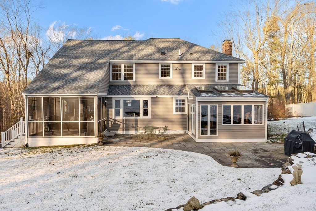 420 Old Harvard Road Boxborough, MA 01719 - Photo 2 of 37 a front view of a house with a yard
