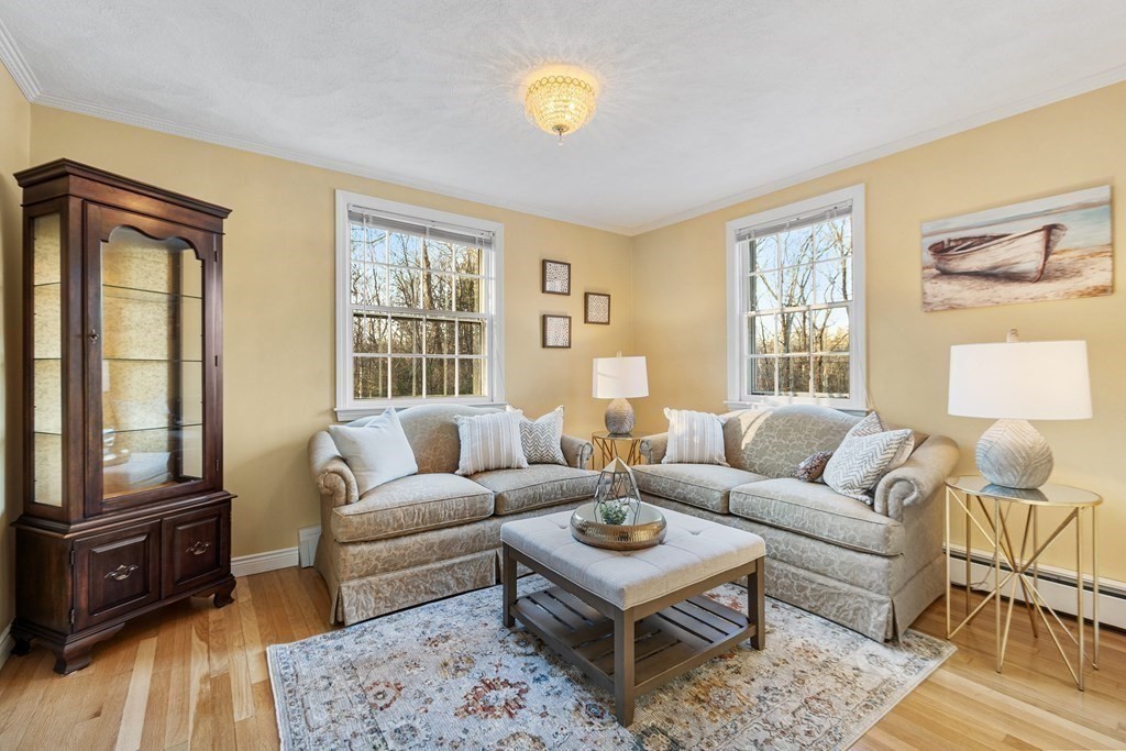 420 Old Harvard Road Boxborough, MA 01719 - Photo 10 of 37 a living room with furniture and a window