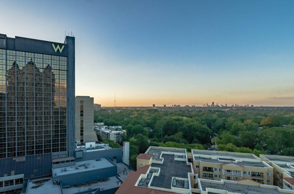 199 14th Street Northeast, Unit 1701 Atlanta, GA 30309 - Photo 1 of 1 Mesmerizing Northern views of Buckhead and west of Peachtree St, east towards Stone Mountain, skyline is electrifying day/night, generously sized balcony.