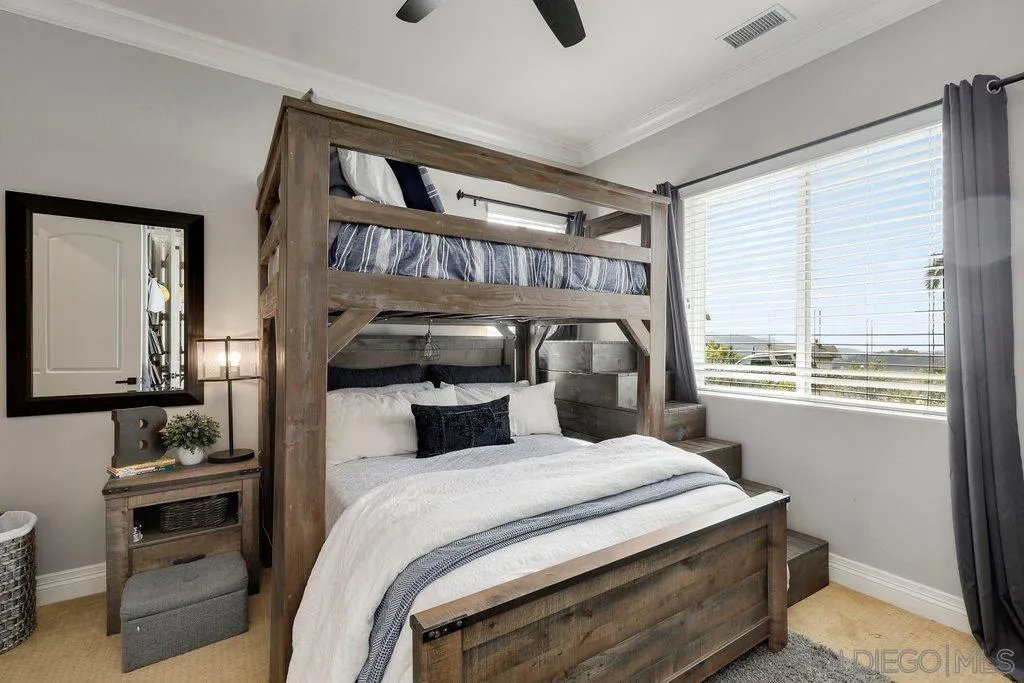 11130 Boulder Pass Escondido, CA 92026 - Photo 21 of 55 a bedroom with a bed and a window