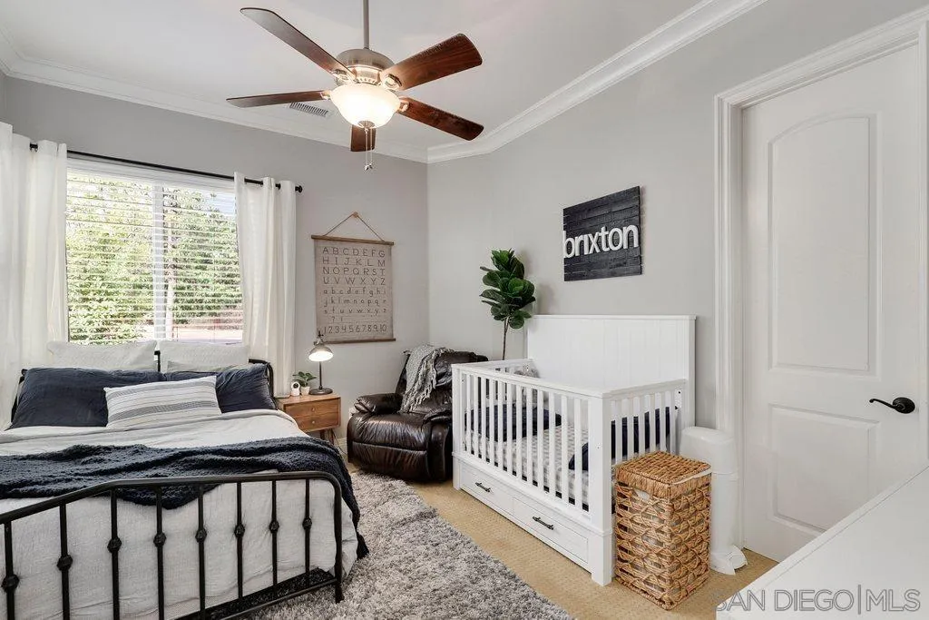 11130 Boulder Pass Escondido, CA 92026 - Photo 22 of 55 a bedroom with a bed and a window