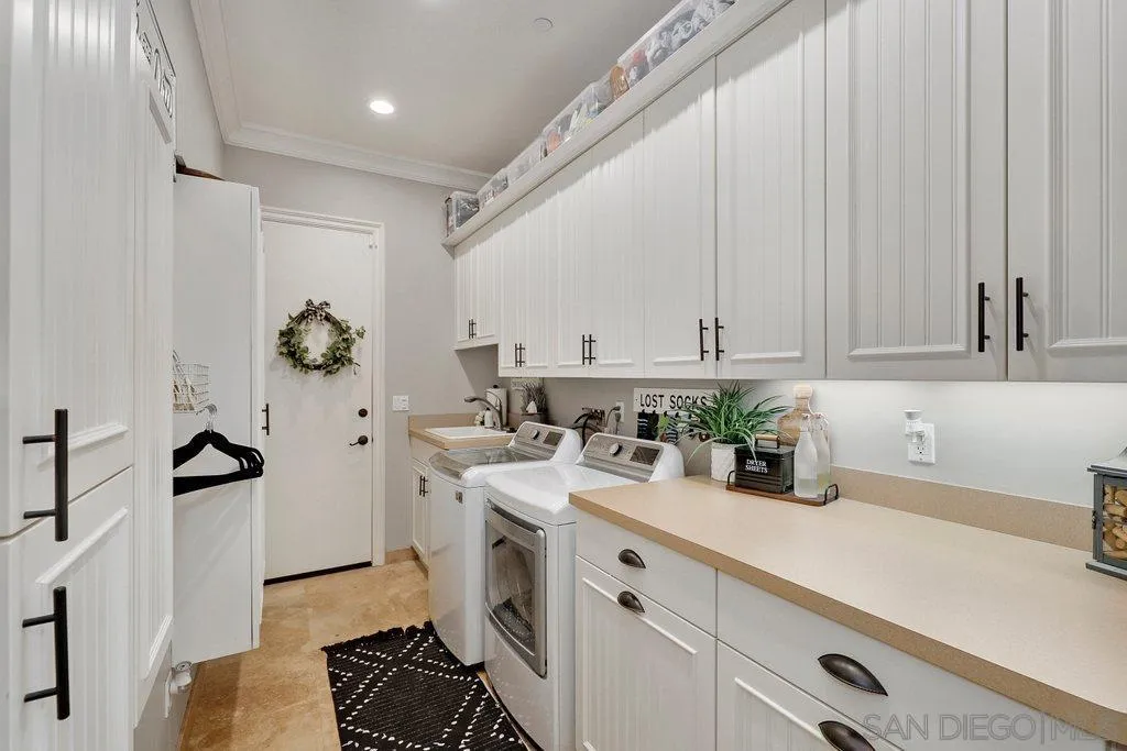 11130 Boulder Pass Escondido, CA 92026 - Photo 24 of 55 a view of a kitchen with sink and cabinets