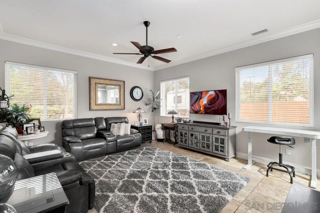 11130 Boulder Pass Escondido, CA 92026 - Photo 28 of 55 a living room with furniture and a flat screen tv