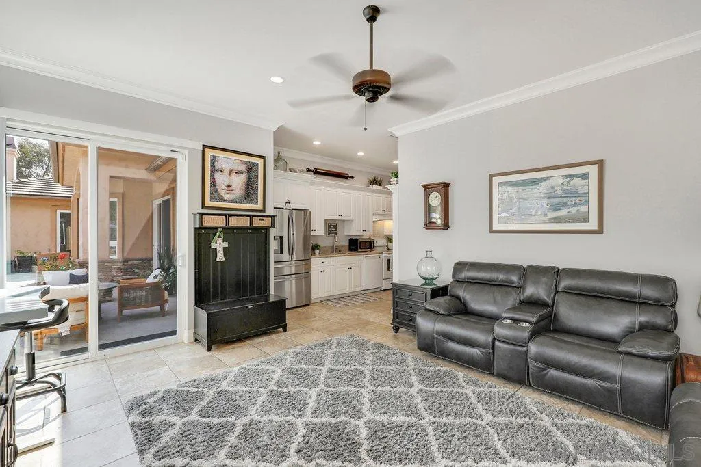 11130 Boulder Pass Escondido, CA 92026 - Photo 30 of 55 a living room with furniture and a fireplace