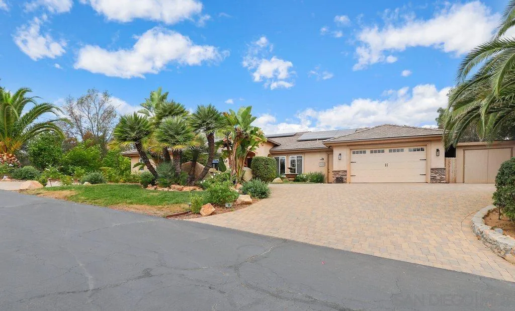 11130 Boulder Pass Escondido, CA 92026 - Photo 55 of 55 a front view of a house with a yard and outdoor seating