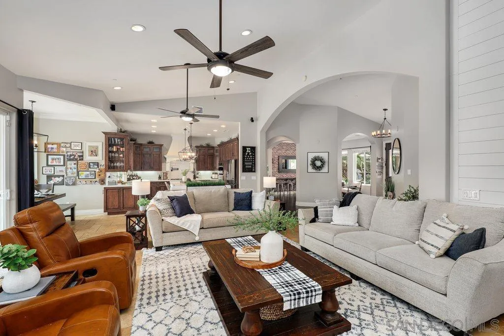 11130 Boulder Pass Escondido, CA 92026 - Photo 6 of 55 a living room with furniture kitchen view and a chandelier