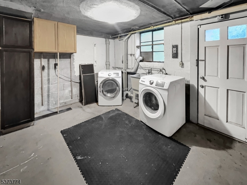 5 Troy Drive Springfield, NJ 07081 - Photo 17 of 21 a utility room with dryer and washer