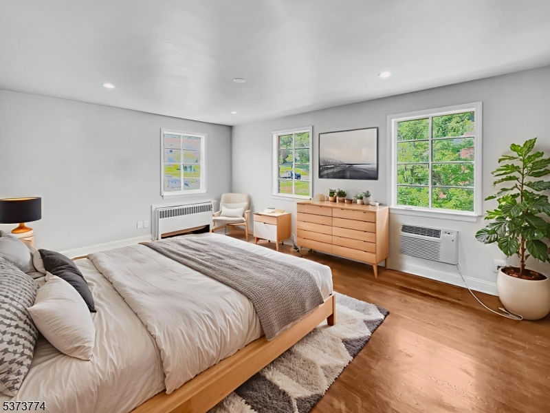 5 Troy Drive Springfield, NJ 07081 - Photo 4 of 21 a bedroom with a bed and window