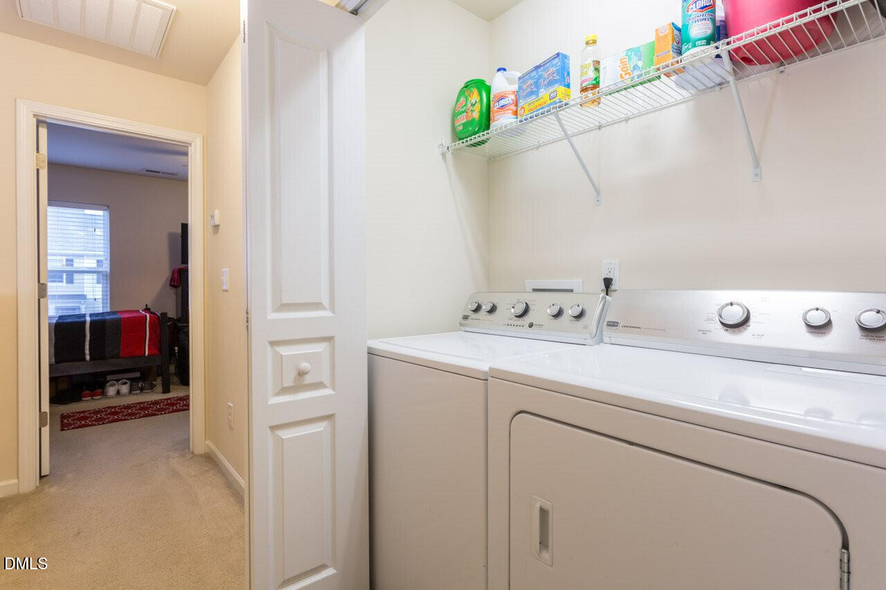 4009 Tresco Crossing Raleigh, NC 27616 - Photo 20 of 23 a utility room with dryer and washer